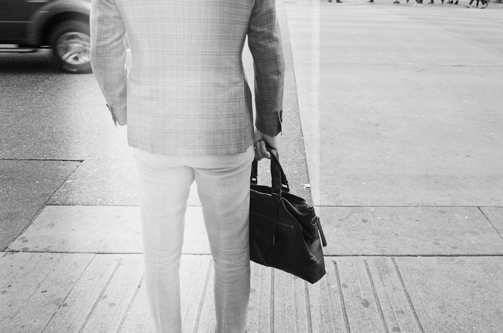 woman in white long sleeve shirt and white pants