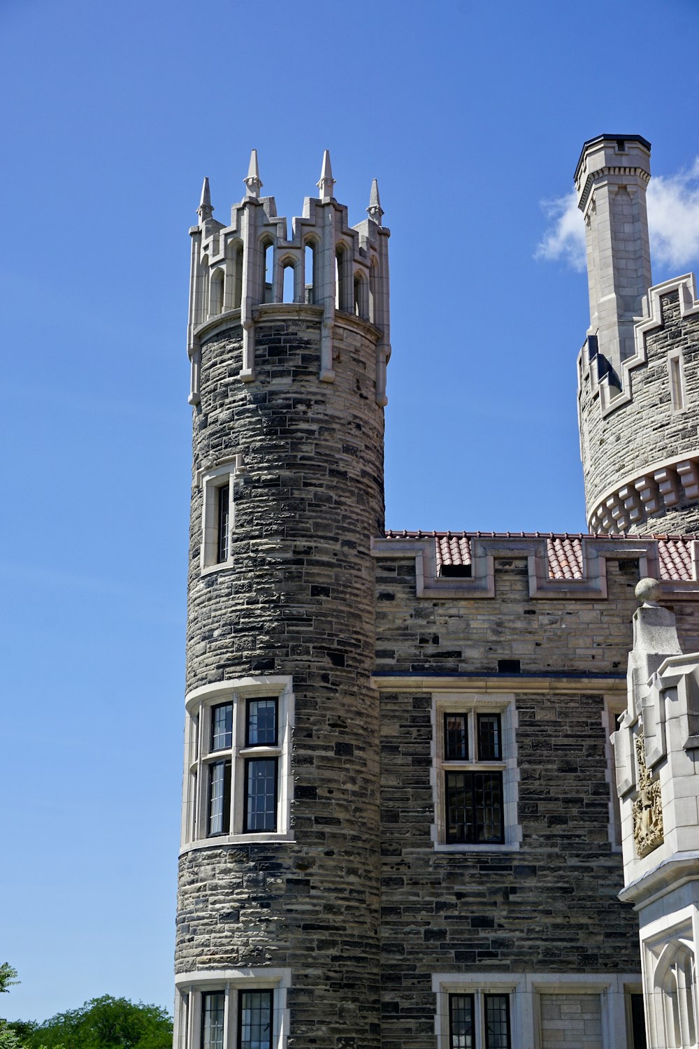 brown brick building under blue sky during daytime