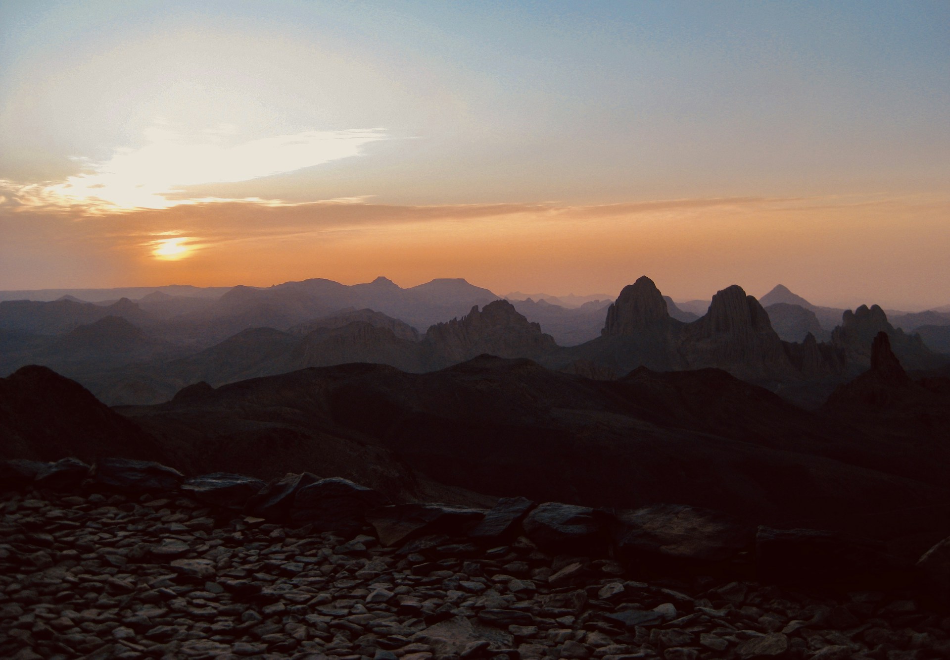 black rocky mountain under blue sky during daytime