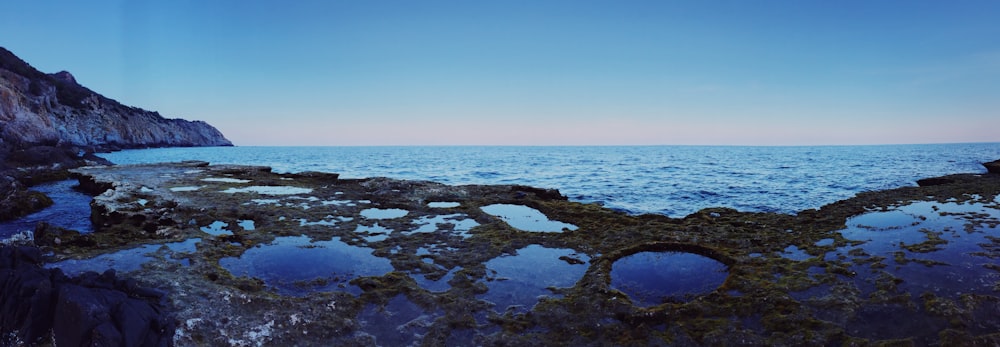 blue ocean water under blue sky during daytime