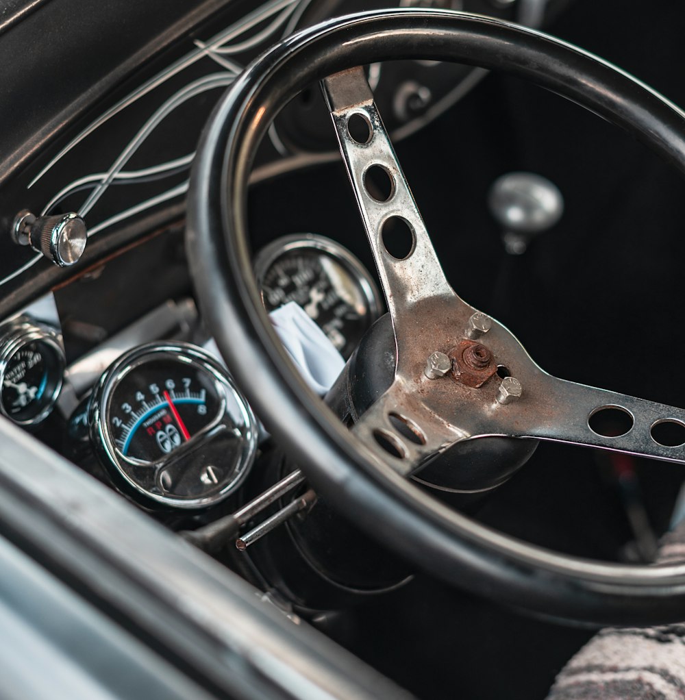 black and silver car steering wheel