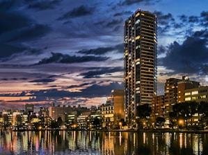 A vibrant city skyline showcasing modern urban development at dusk