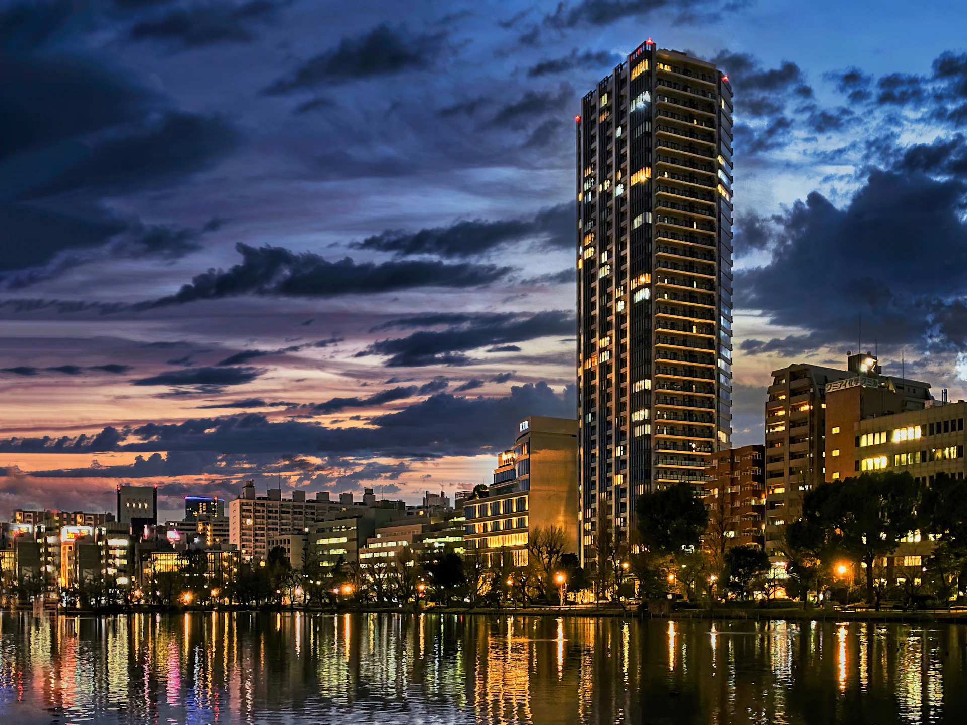 woman wearing yellow long-sleeved dress under white clouds and blue sky during daytime