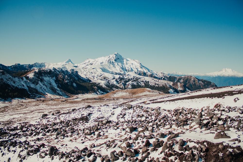 white and black mountains under blue sky during daytime