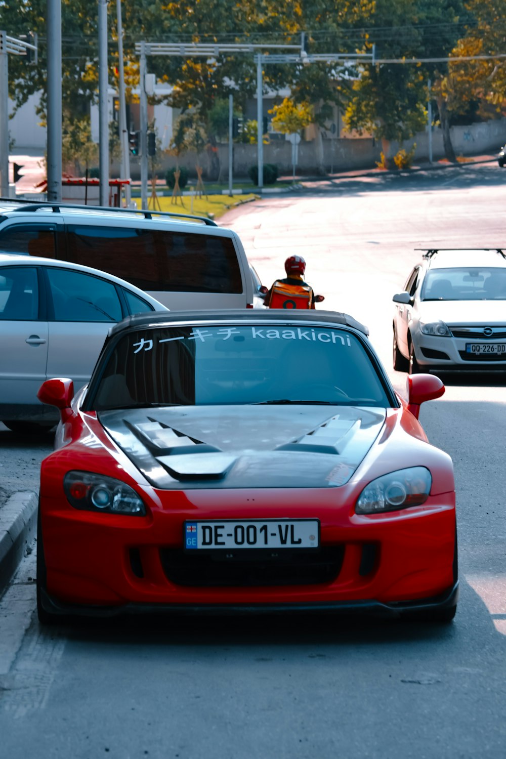 red porsche 911 on road during daytime