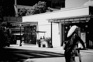 A vibrant urban street scene blending African cultural symbols with contemporary fashion elements.