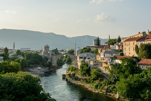 White bridge over river during daytime — Mostar, Bosnia and Herzegovina