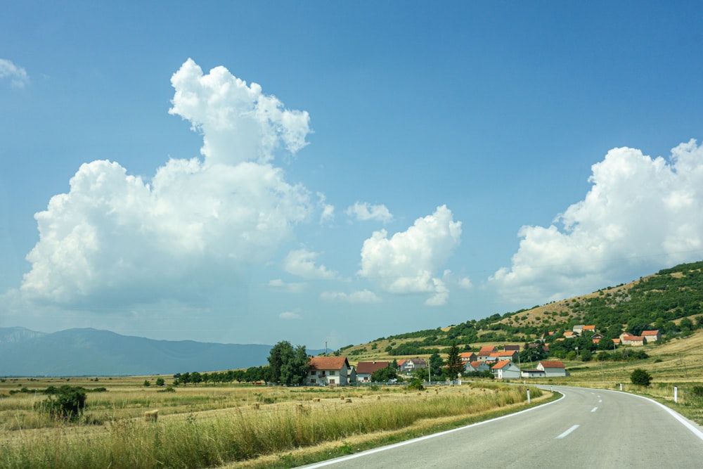 green grass field under blue sky during daytime