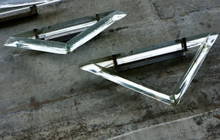 silver ladder on gray concrete floor