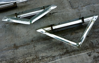 silver ladder on gray concrete floor