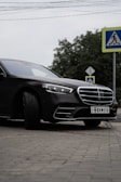 black mercedes benz coupe on road during daytime