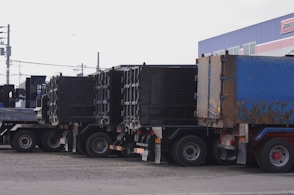 blue and brown freight truck on road during daytime