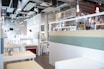 white and brown wooden table and chairs
