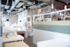 white and brown wooden table and chairs
