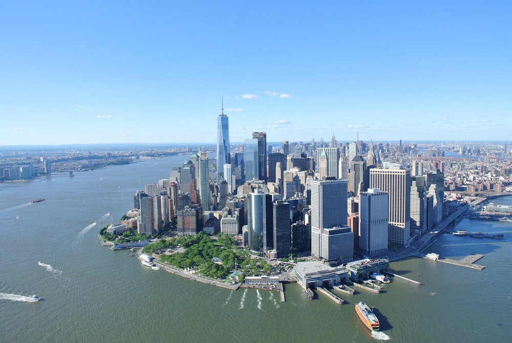 high rise buildings near body of water during daytime