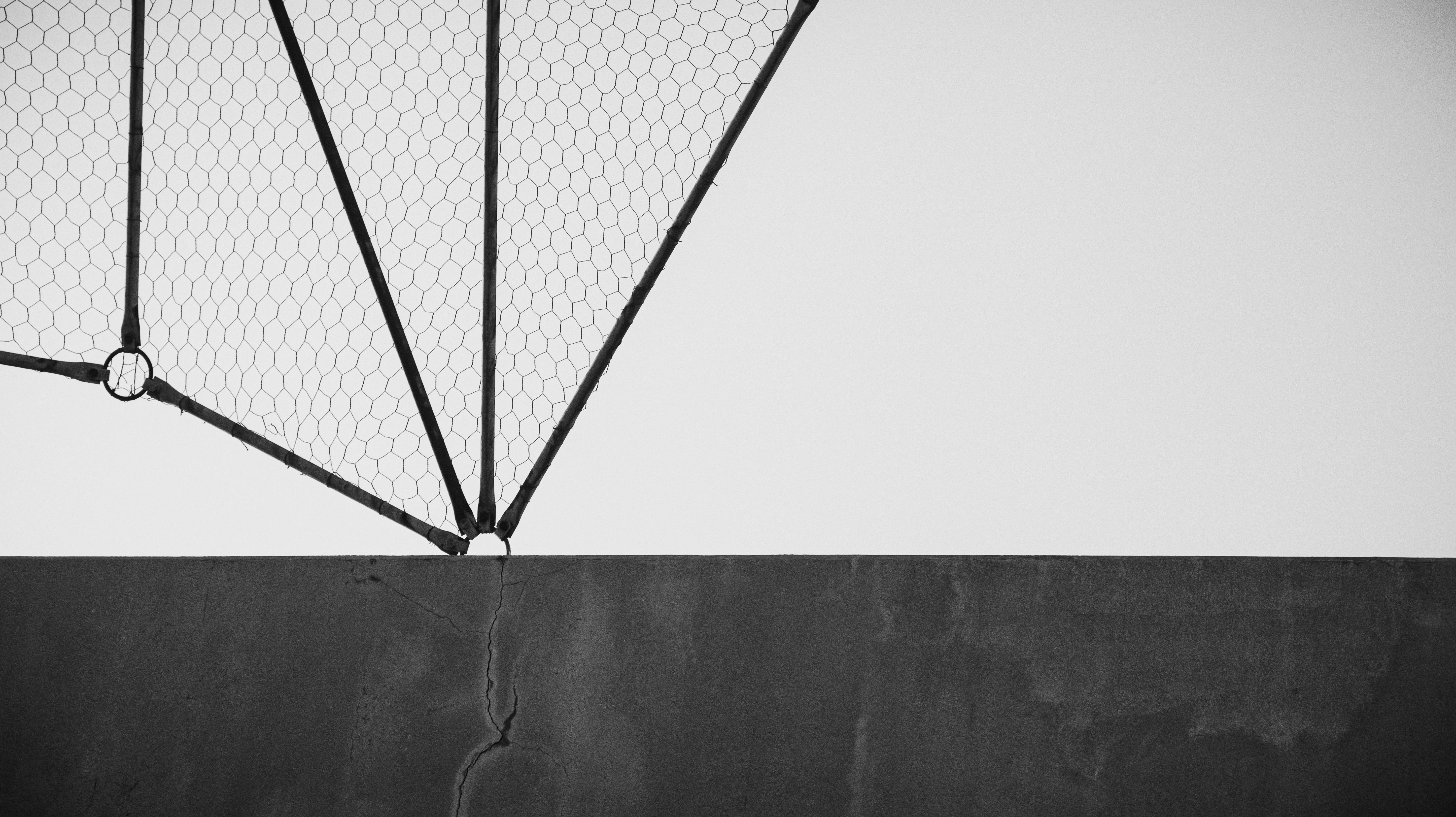 black umbrella on gray surface
