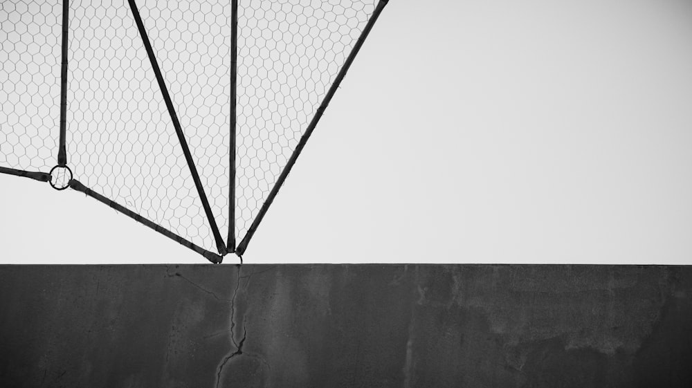 black umbrella on gray surface