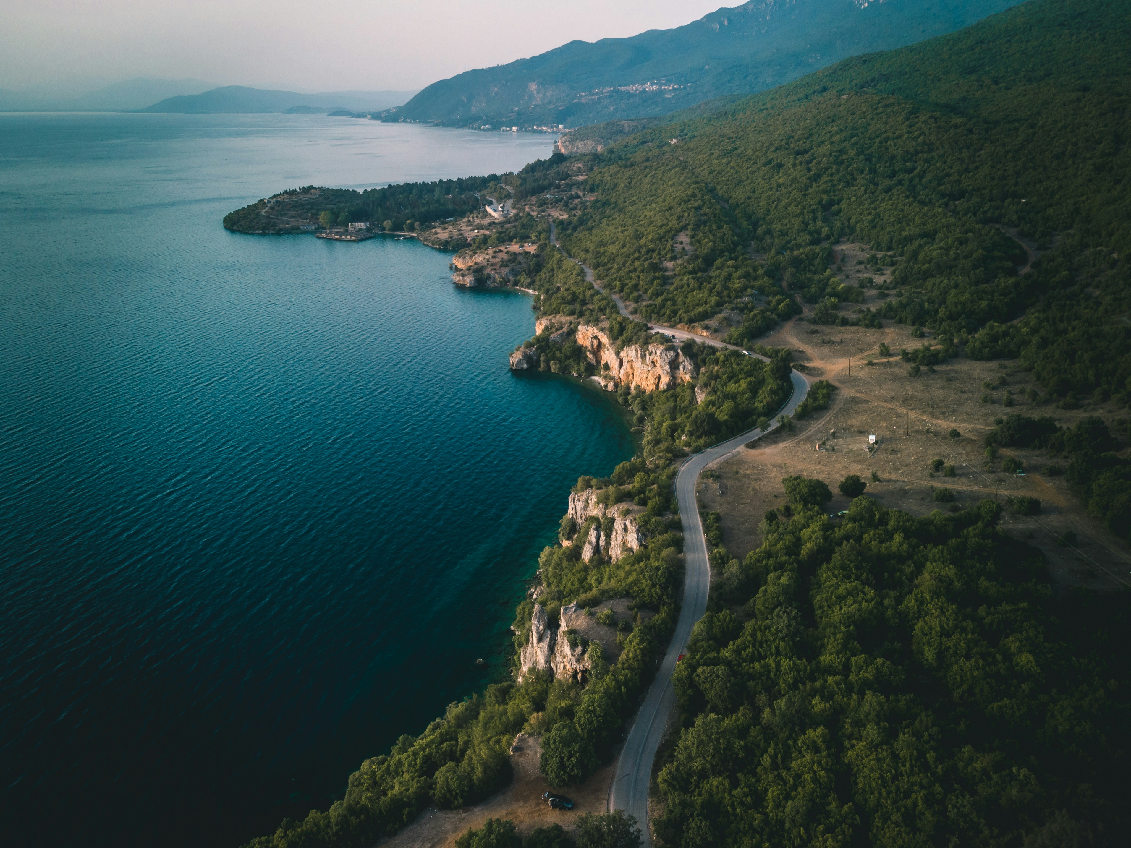 aerial view of green trees and river during daytime, Ohrid Lake