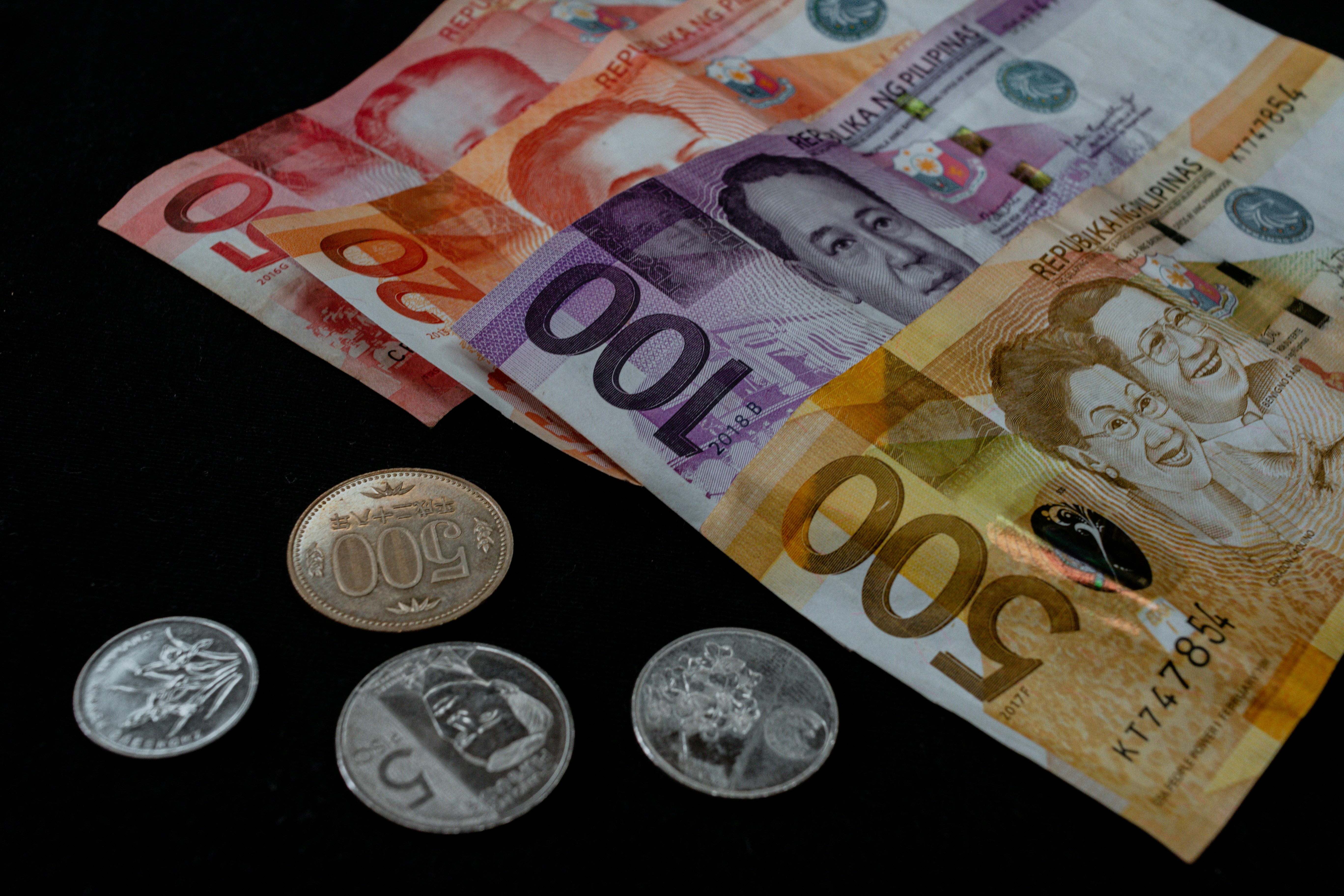 silver round coins and 100 euro coins