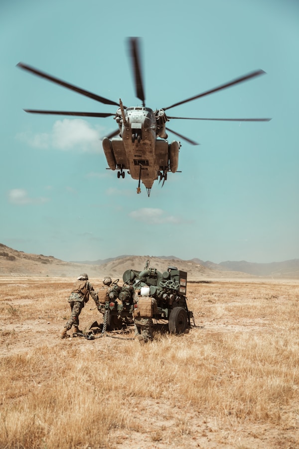 U.S. Marines with Beach and Terminal Operations Company, 1st Landing Support Battalion, 1st Marine Logistics Group, I Marine Expeditionary Force, conduct an external lift of a bulk fuel pump with U.S. Marine Heavy Helicopter Squadron (HMH) 361, Marine Aircraft Group 16, 3rd Marine Aircraft Wing, on Camp Pendleton, California, May 18, 2021.by Joel Rivera-Camacho