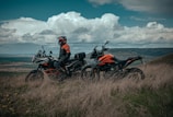 man riding on red and black sports bike