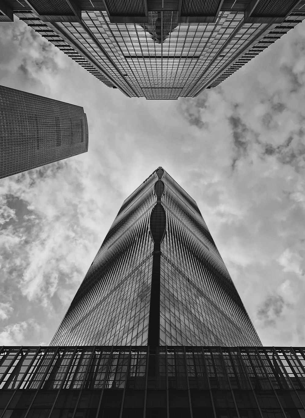 grayscale photo of high rise building