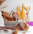 brown and white doughnuts on white basket