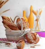 brown and white doughnuts on white basket