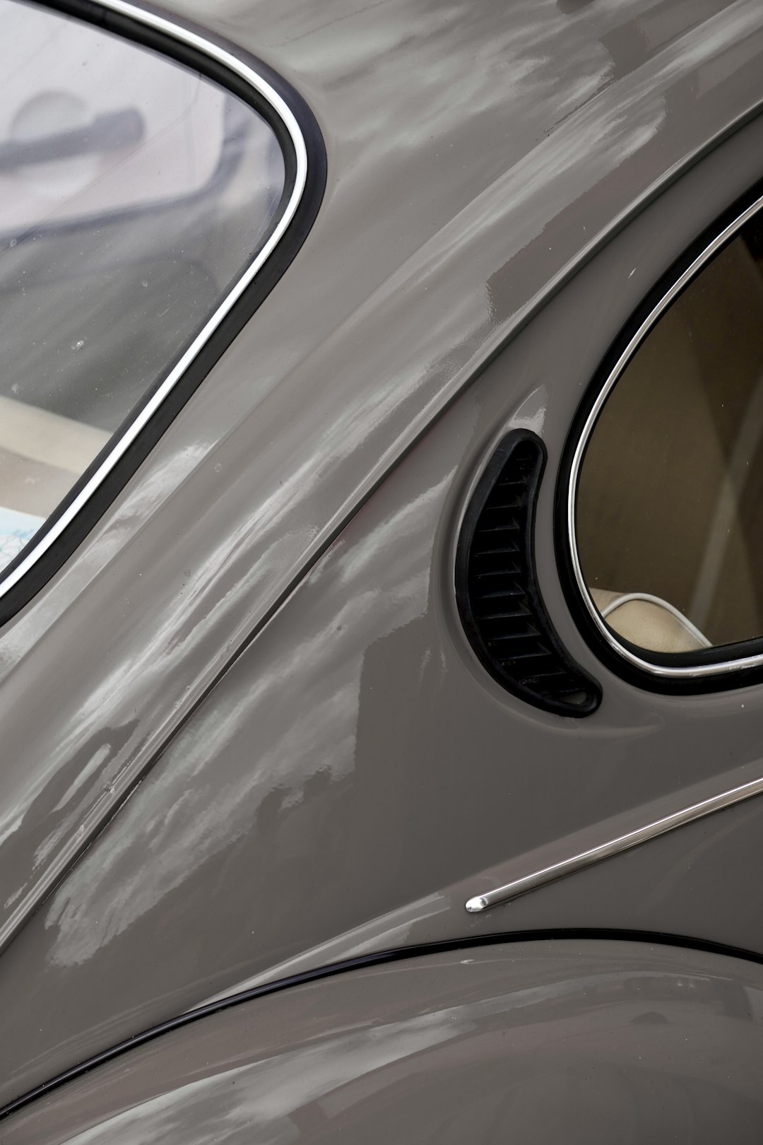 silver car with white and black car door