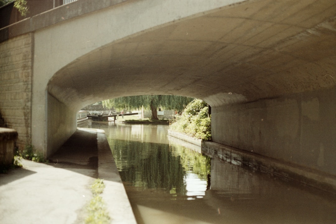 brown concrete bridge over river