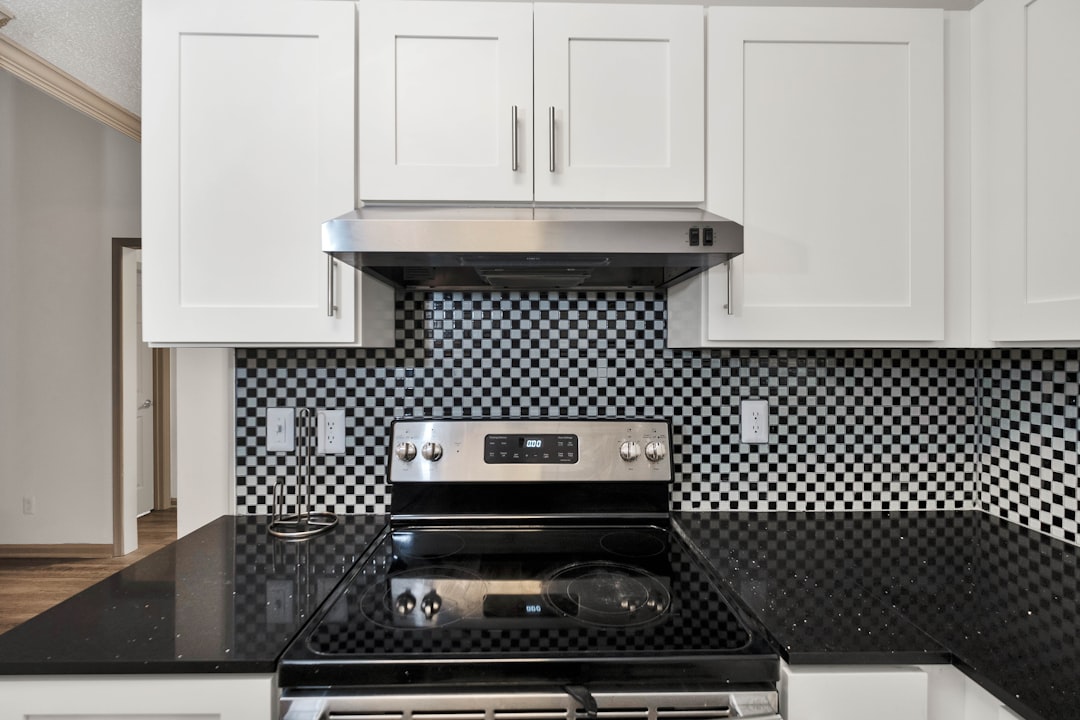 silver and black gas range