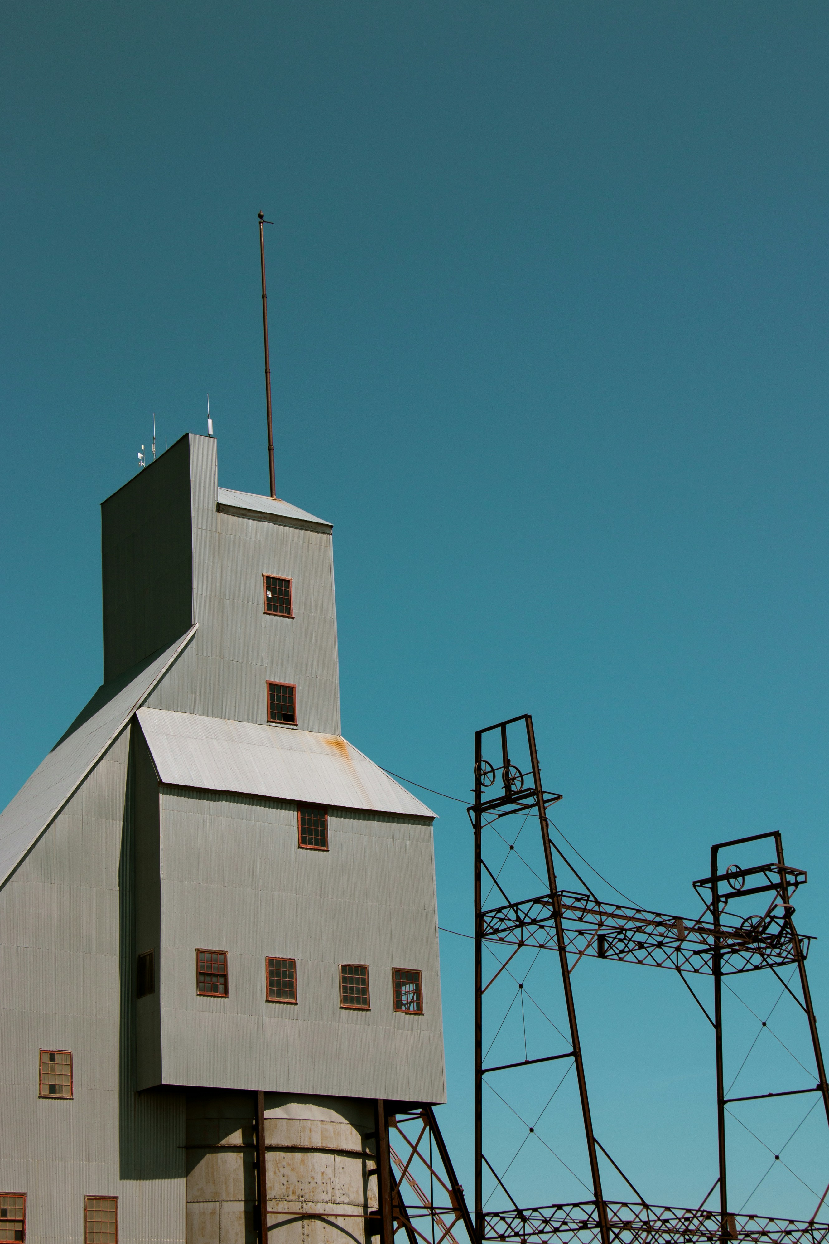 white concrete building under blue sky during daytime