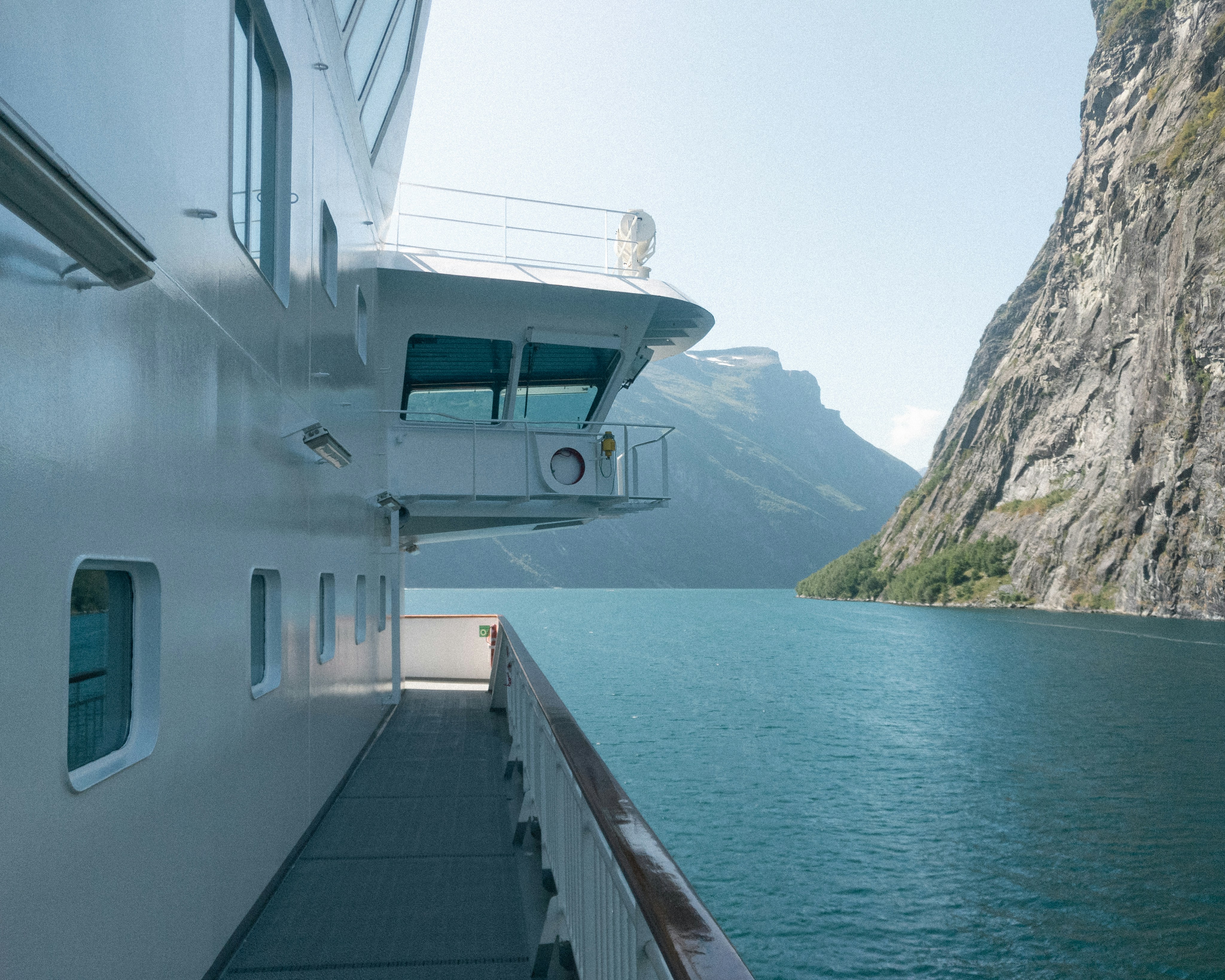 white boat on body of water during daytime