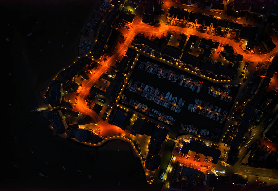 Aerial view of city buildings lit up at night