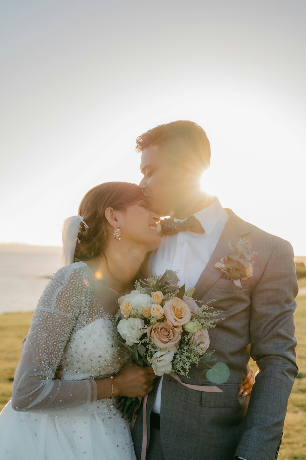 man and woman kissing during daytime