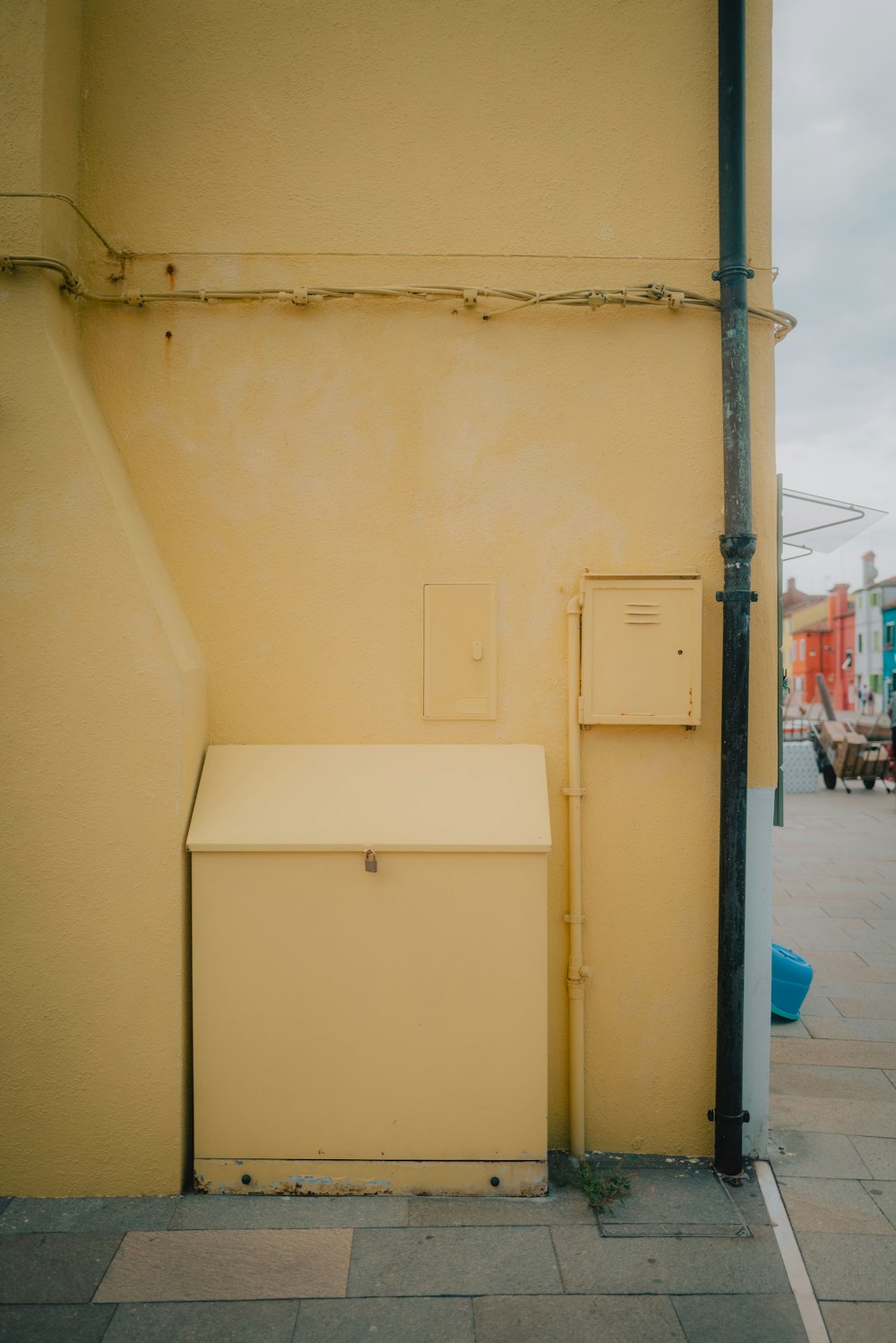 white wooden door near white wall