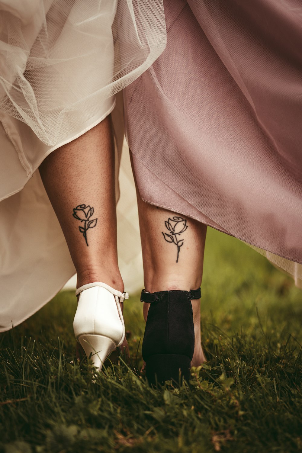 woman in white skirt and black leather shoes