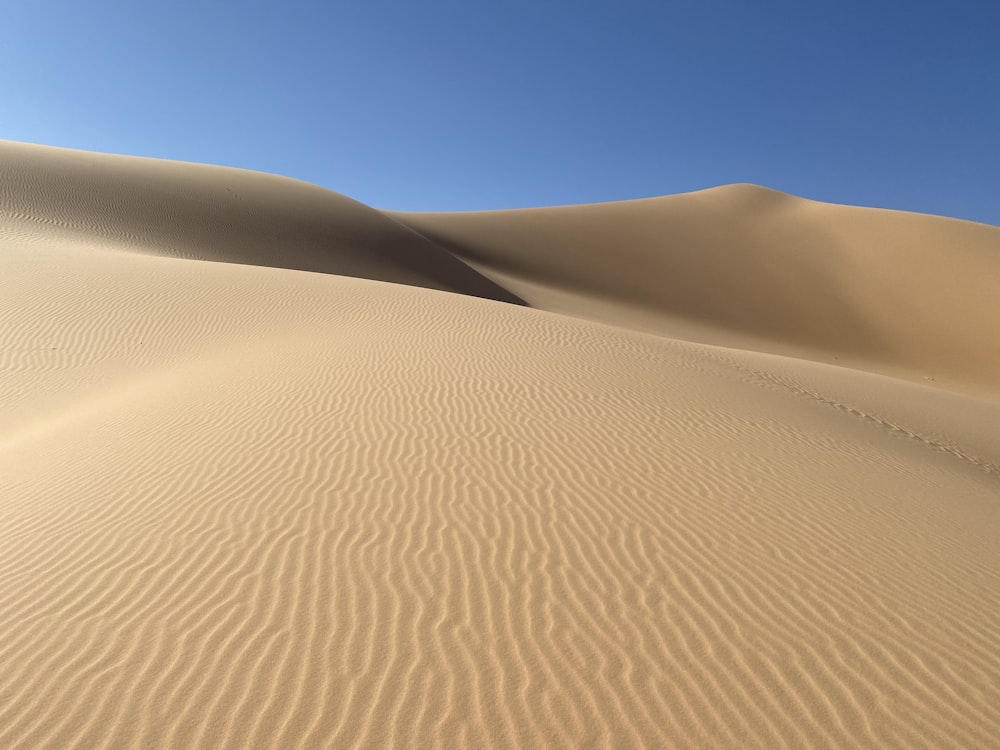 desert under blue sky during daytime