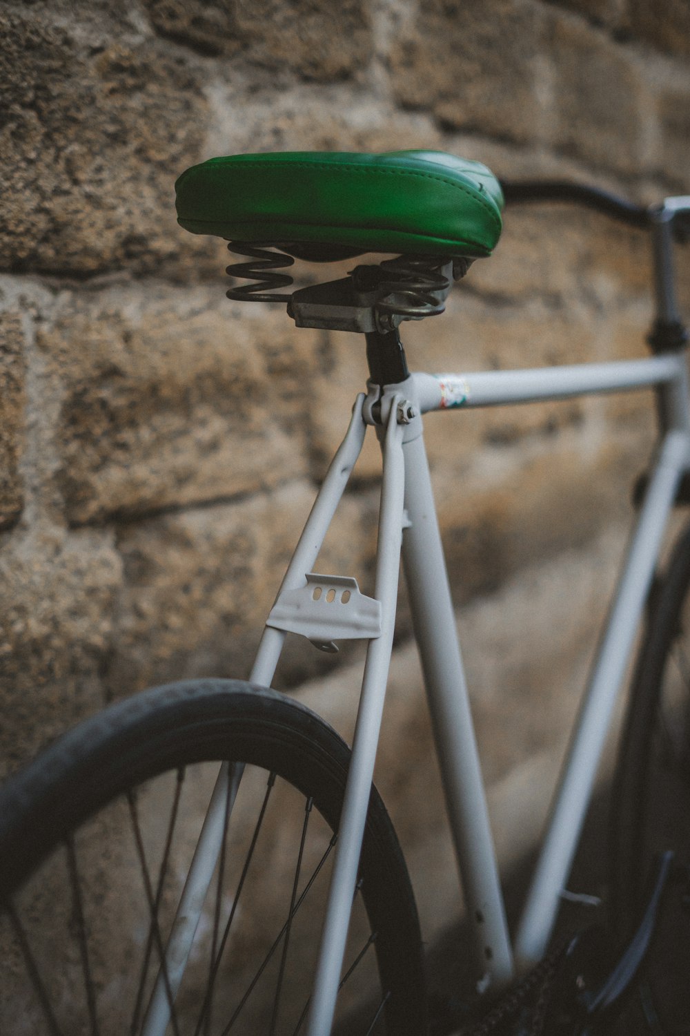 green and white bicycle wheel