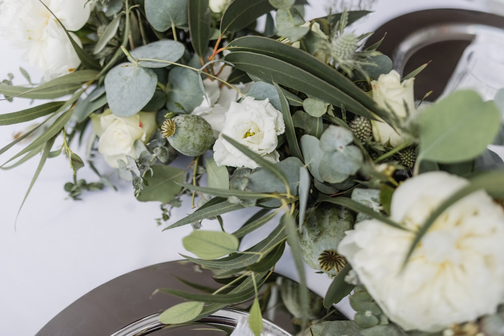 white flowers on white ceramic plate