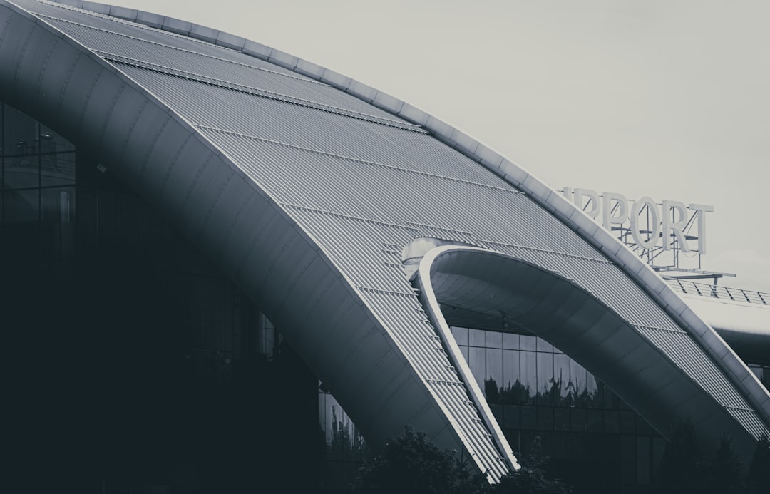 grayscale photo of a bridge