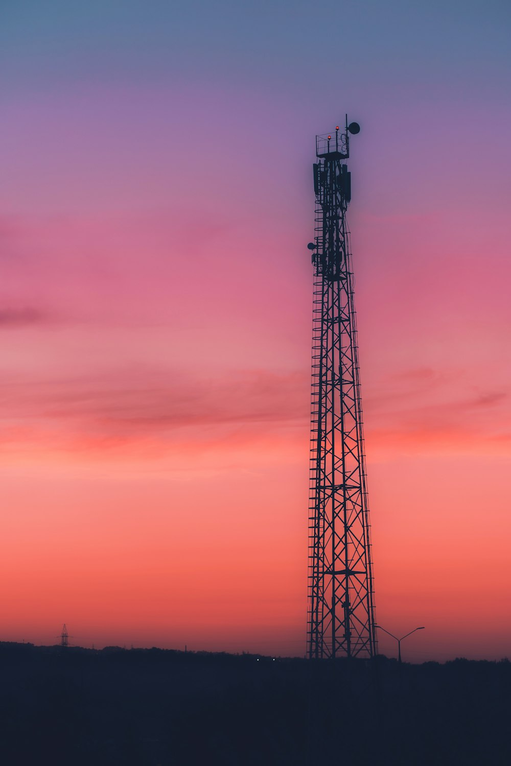 black tower under red sky