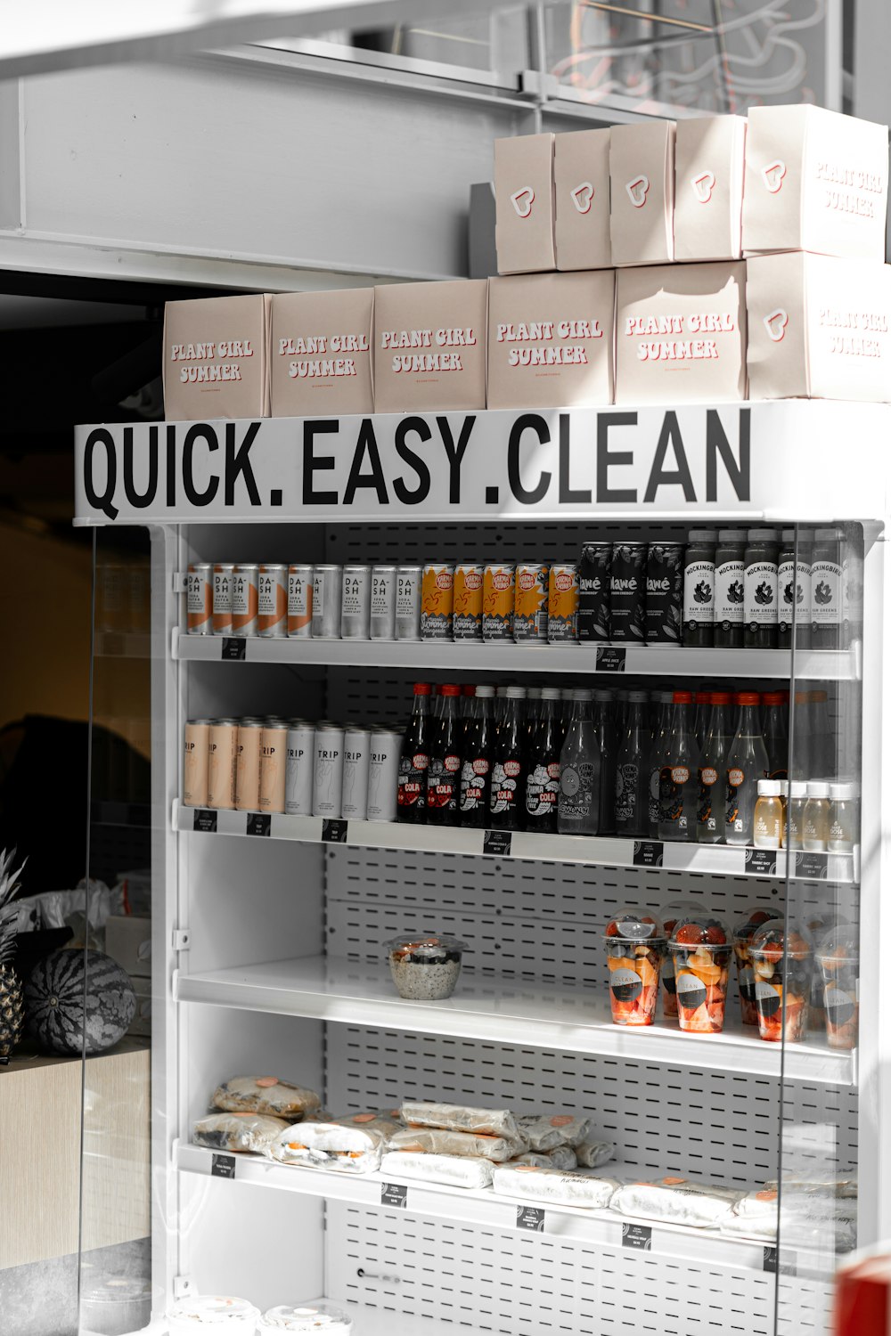 white wooden shelf with bottles