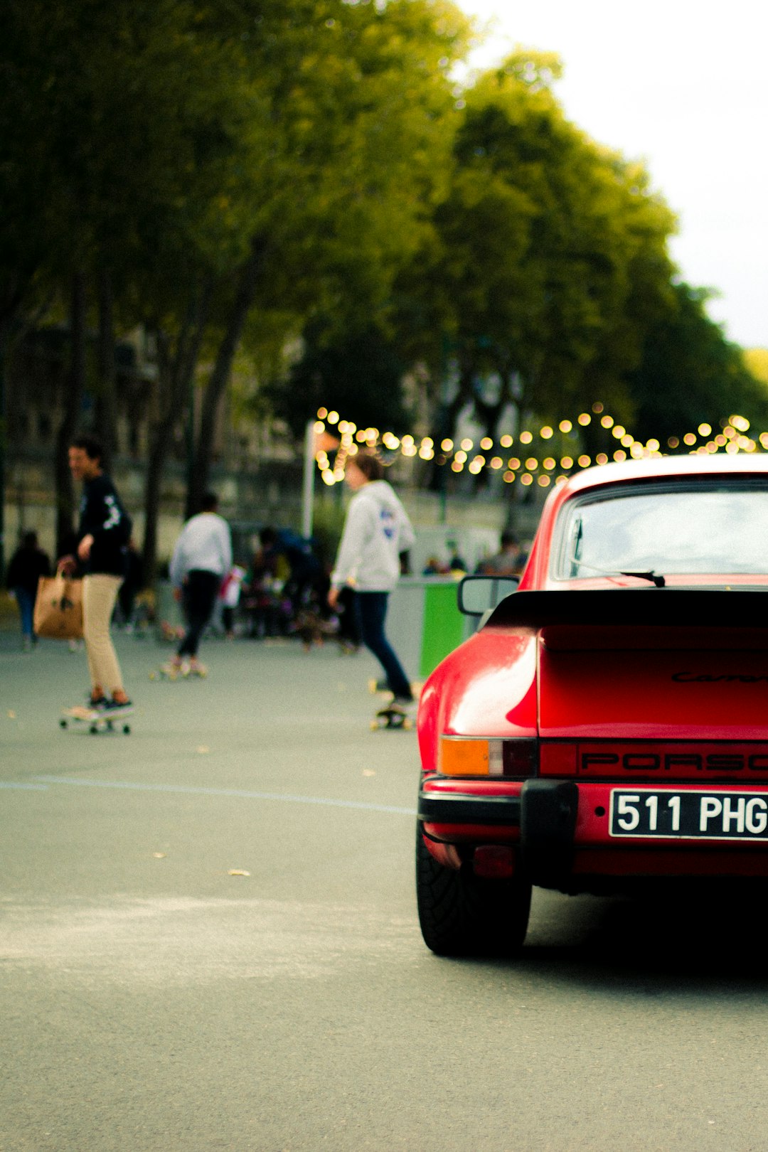 red car on road during daytime