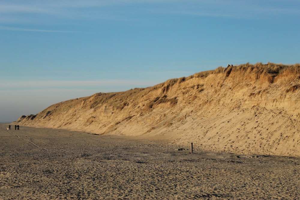 brown rock formation under blue sky during daytime