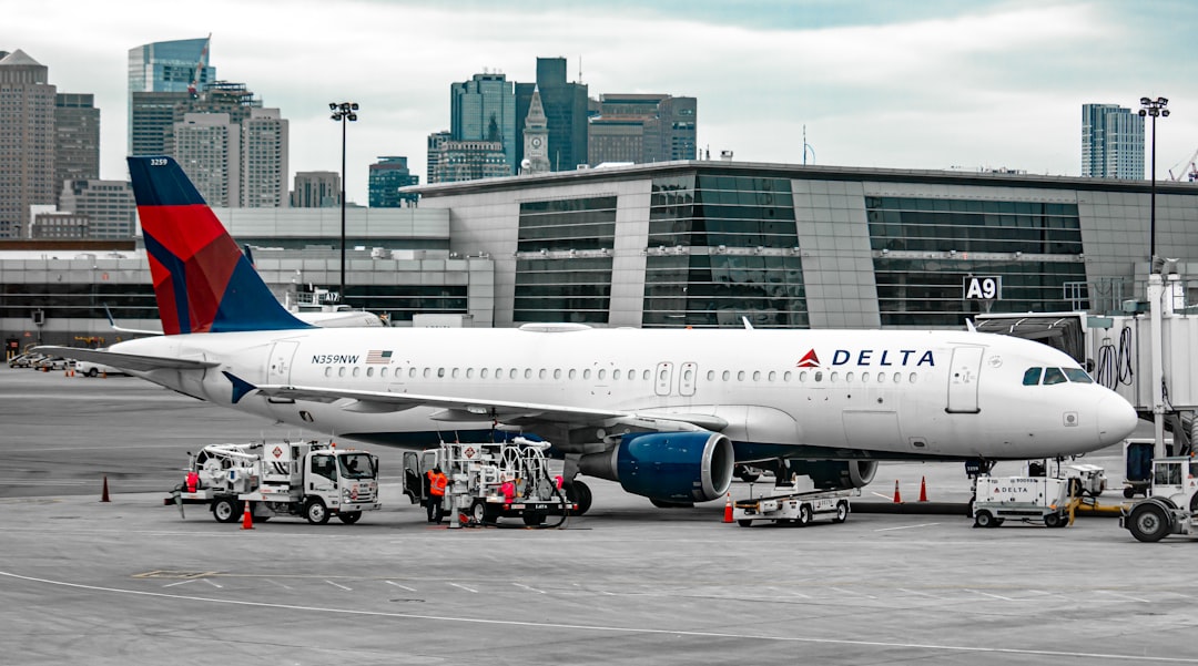 white passenger plane on airport during daytime,