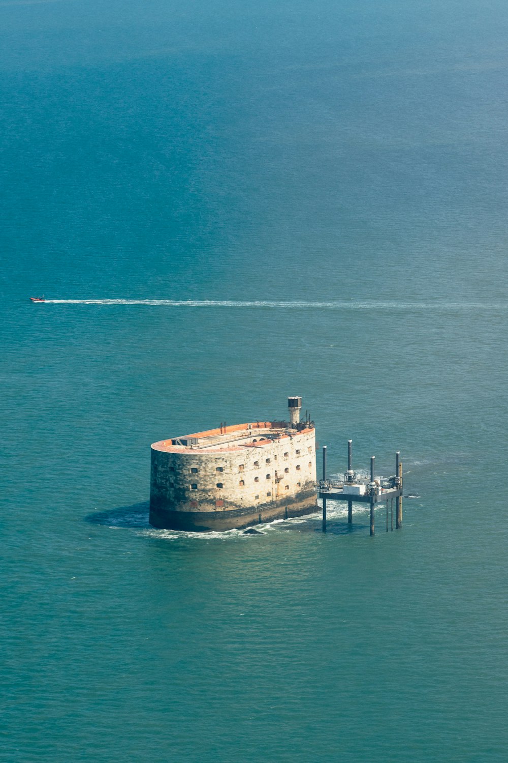 white ship on sea during daytime