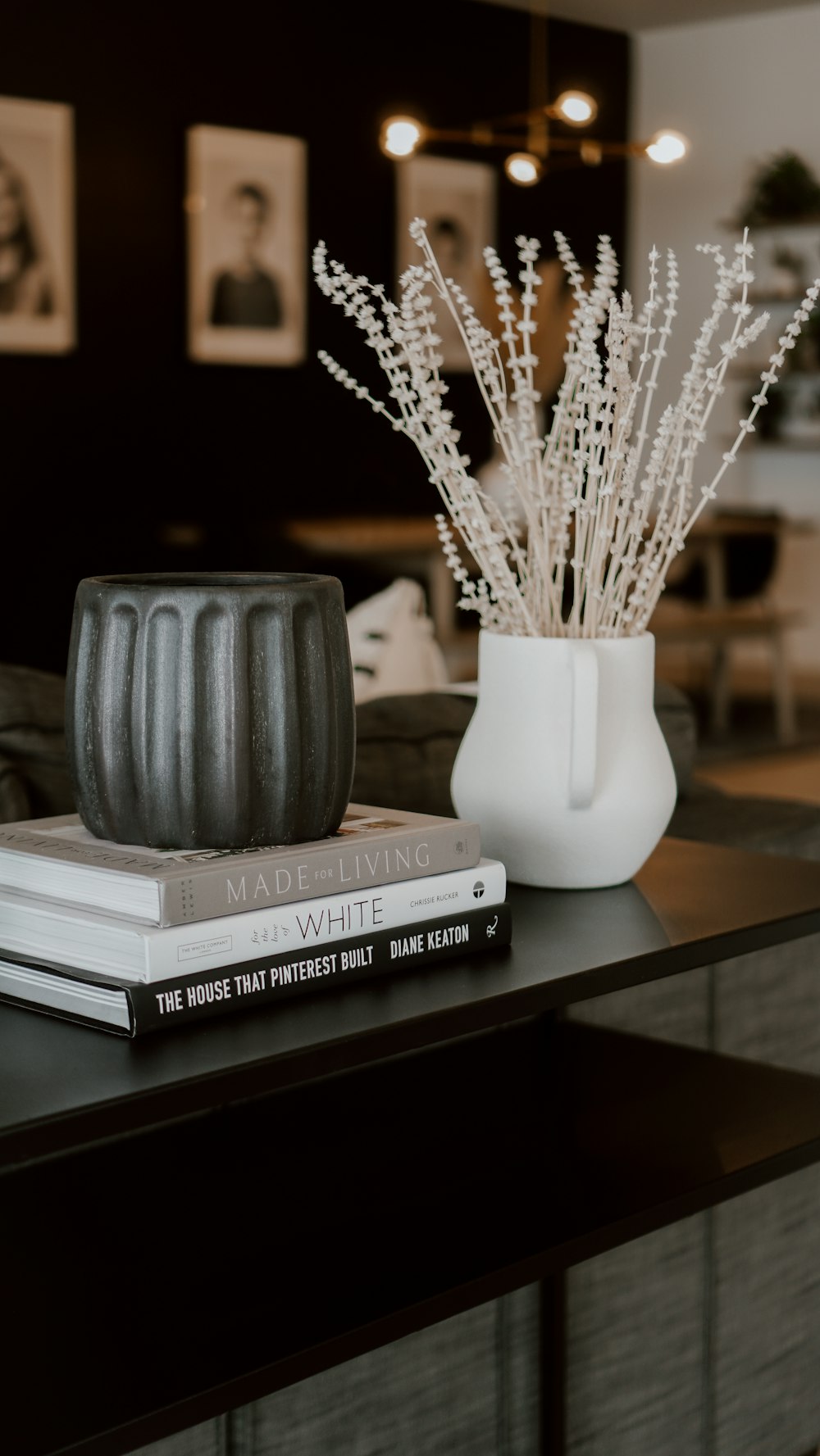 white ceramic vase on brown wooden table