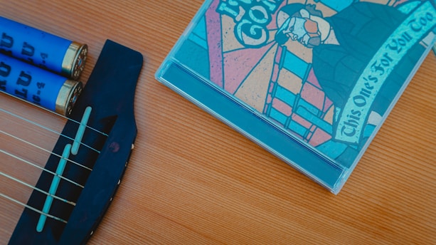 A vibrant cover art featuring musical notes and instruments.