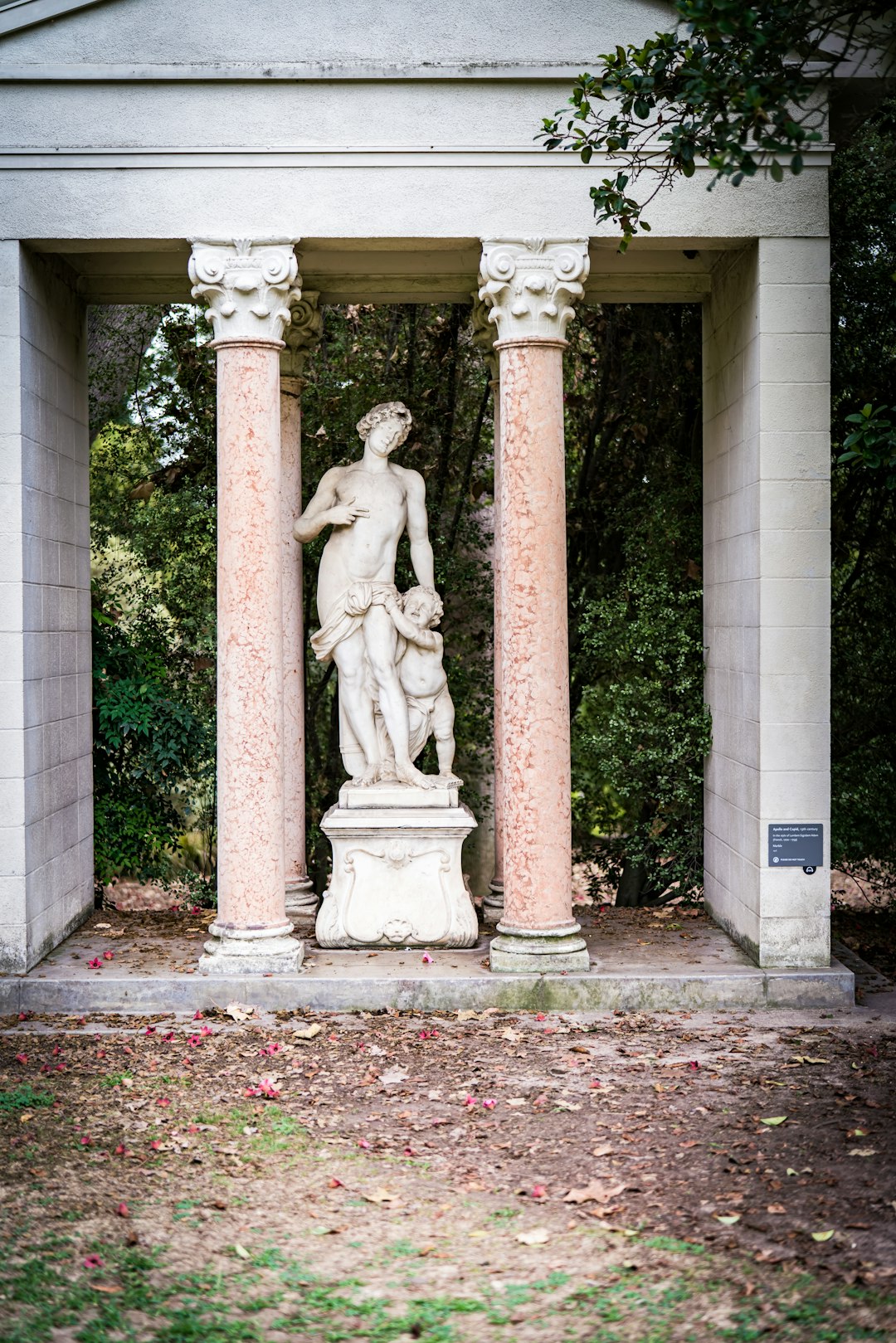 brown concrete statue of man